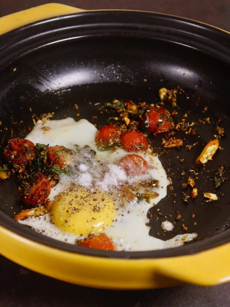 add egg and powdered spices to the pan and mix well 