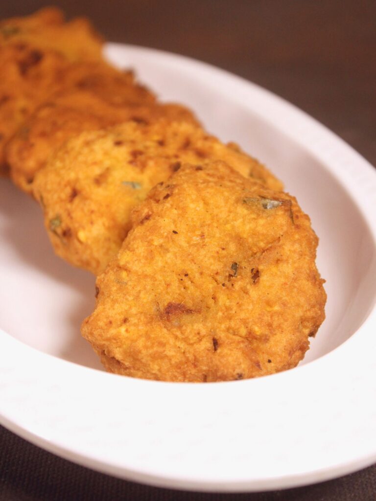 enjoy Parippu vada with ketchup or chutney 