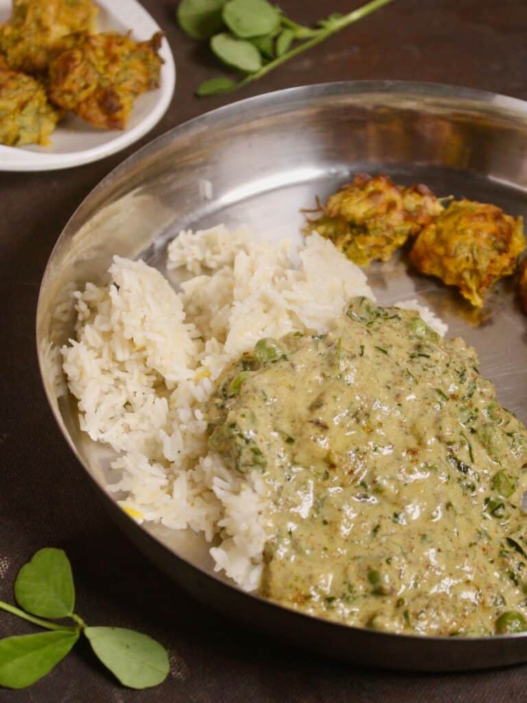 serve hot Methi Matar Malai gravy with rice or roti