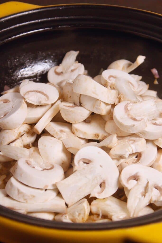 add chopped mushrooms to the pan and saute 