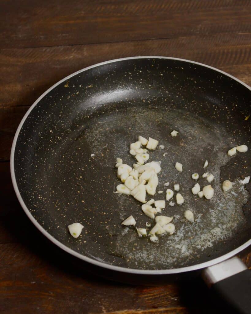 add minced garlic in a pan 