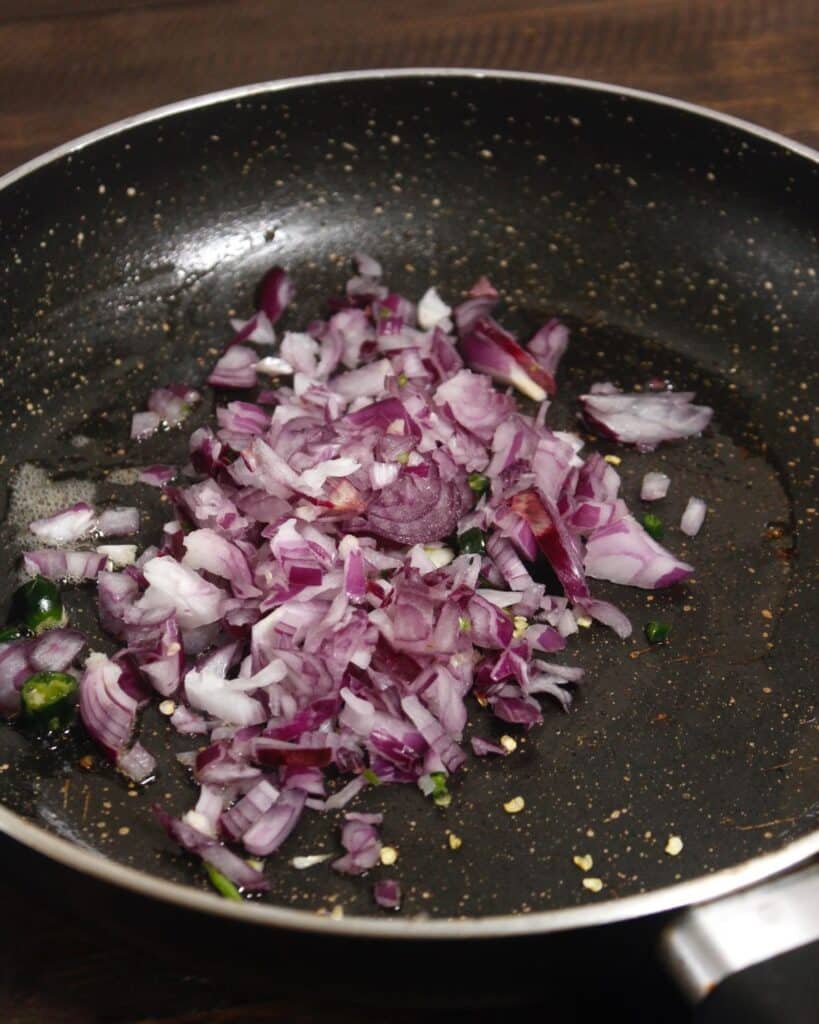 add chopped onions to the pan 