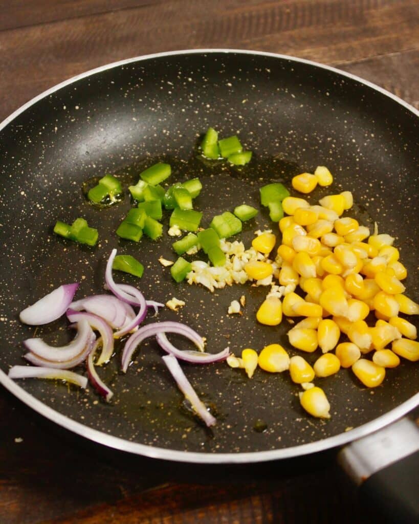 add other vegies of rice into the pan 