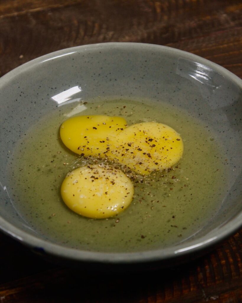 take 3 eggs in a bowl and add some spices