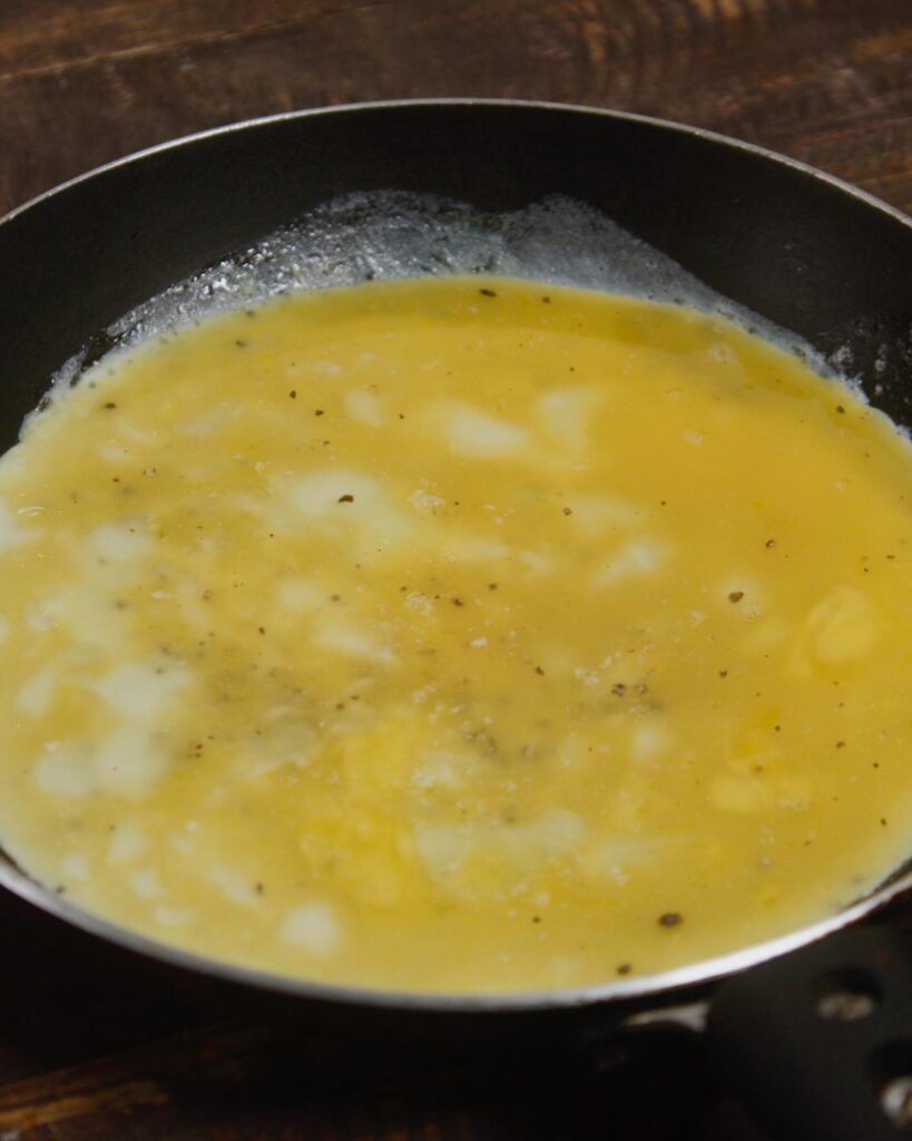 spread the egg mixture on the pan 