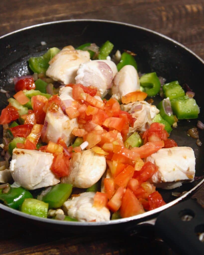 add chopped tomatoes' to the pan 