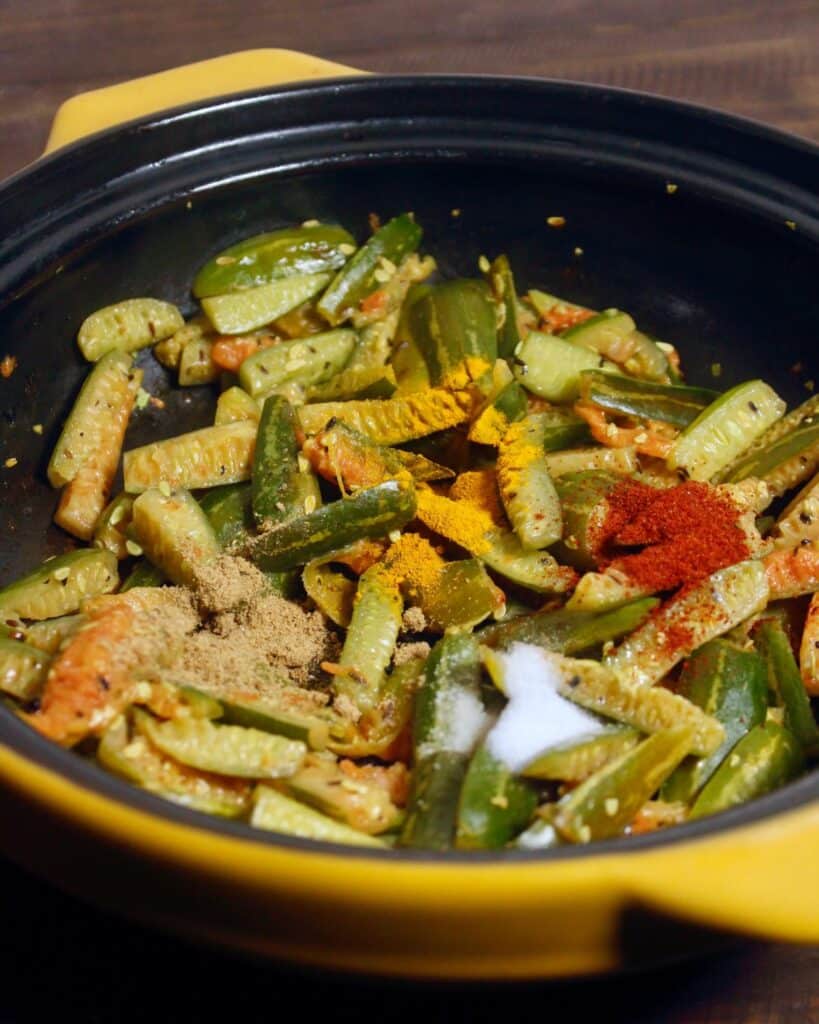 add all the spices to the pan and cook well