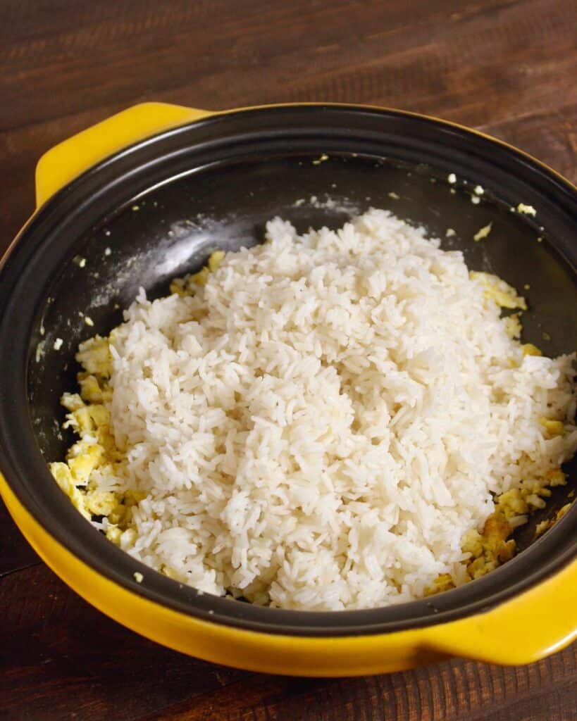add boiled rice to the pan 