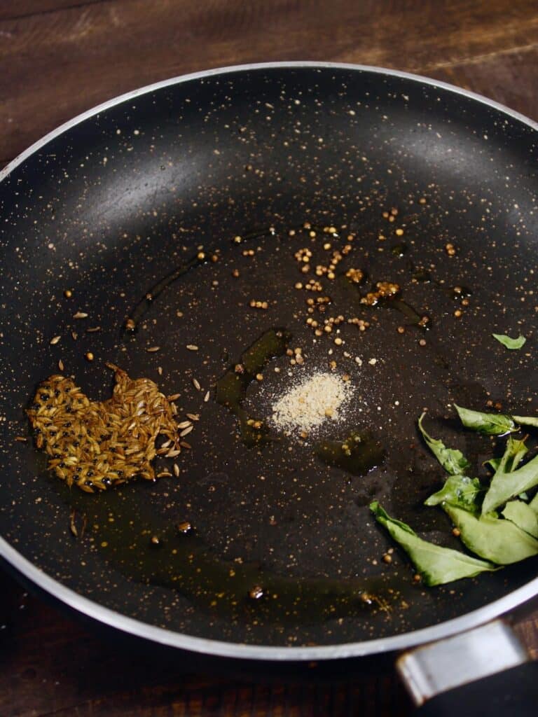 roast seeds and leaf into the pan 