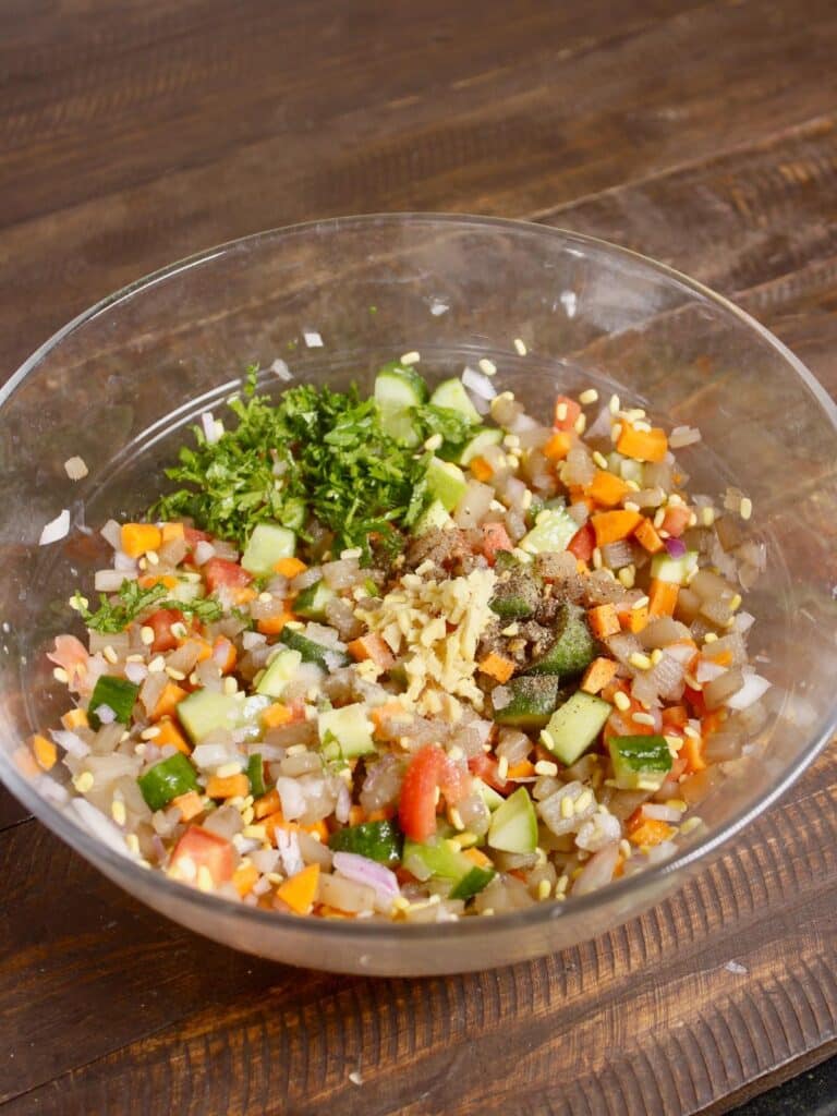 add all the ingredients of the salad into the bowl 