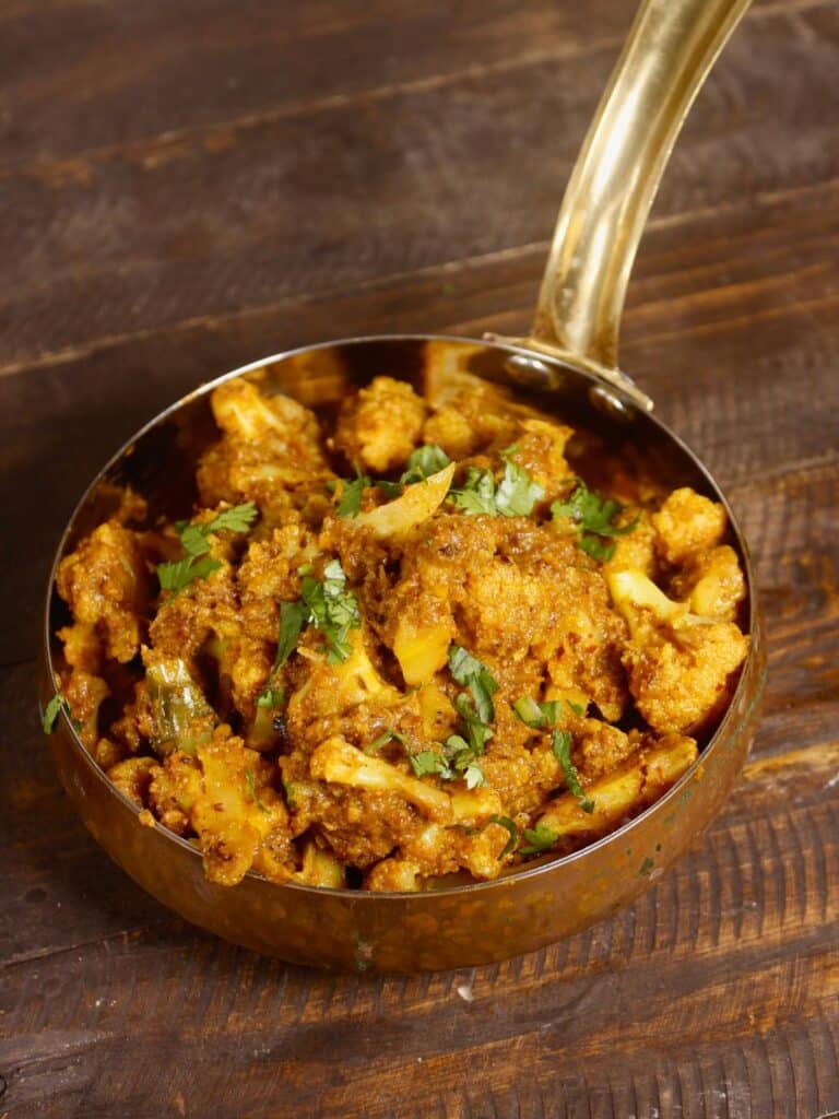 enjoy Cauliflower Xacuti with rice or chappati 