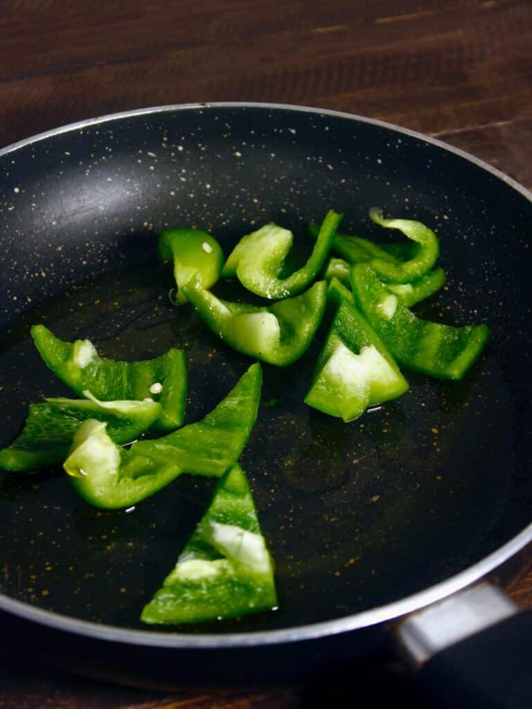 take some bell peppers in a pan 
