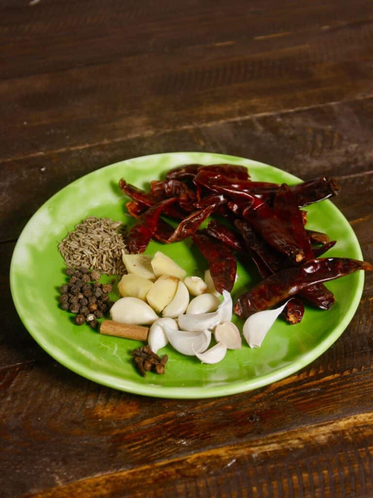 take all the ingredients for the paste in a grinder