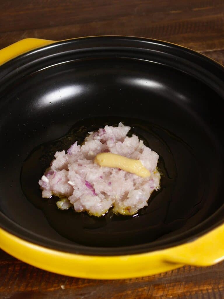 onion, ginger garlic paste in a pan