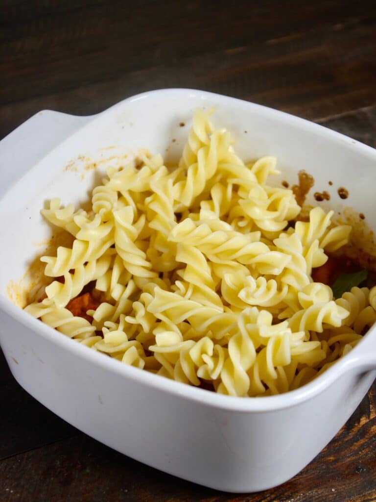 add boiled pastas to the tomato mixer 