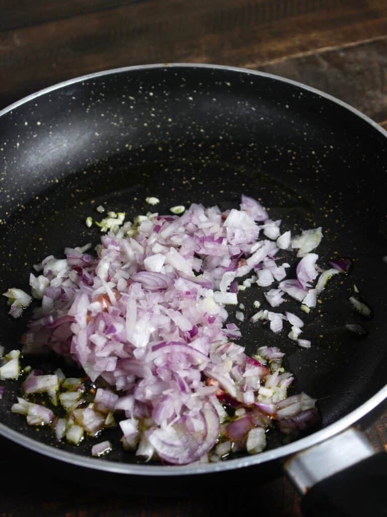 chopped onions, garlic and oil in a pan 