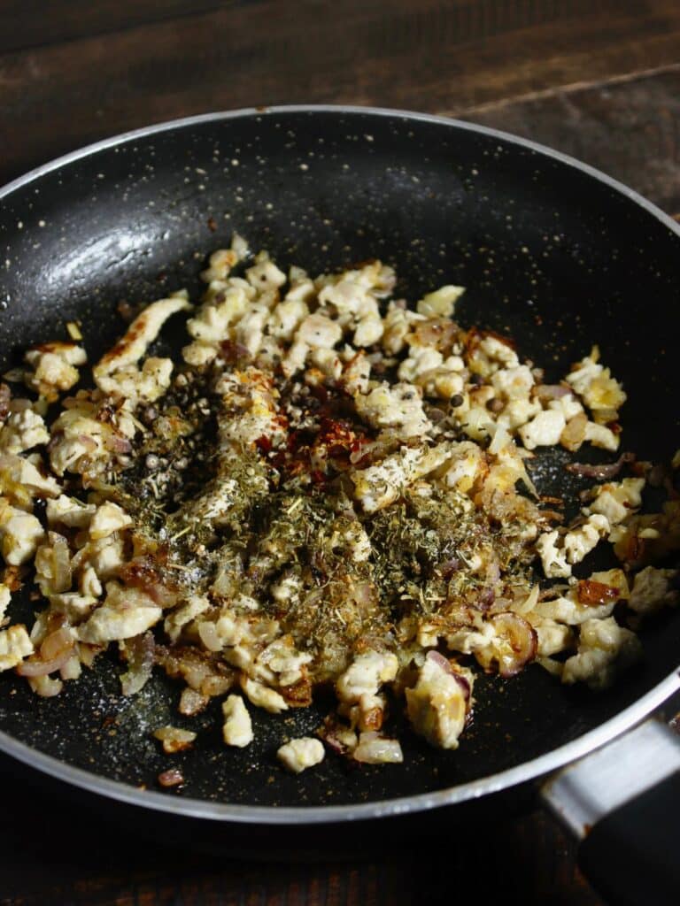 add powdered spices to the pan and saute  