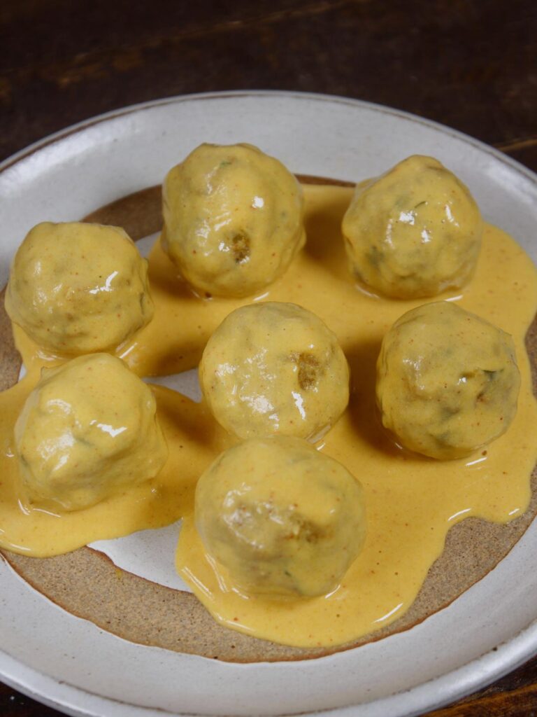 coat the potato balls with the flour mixture 