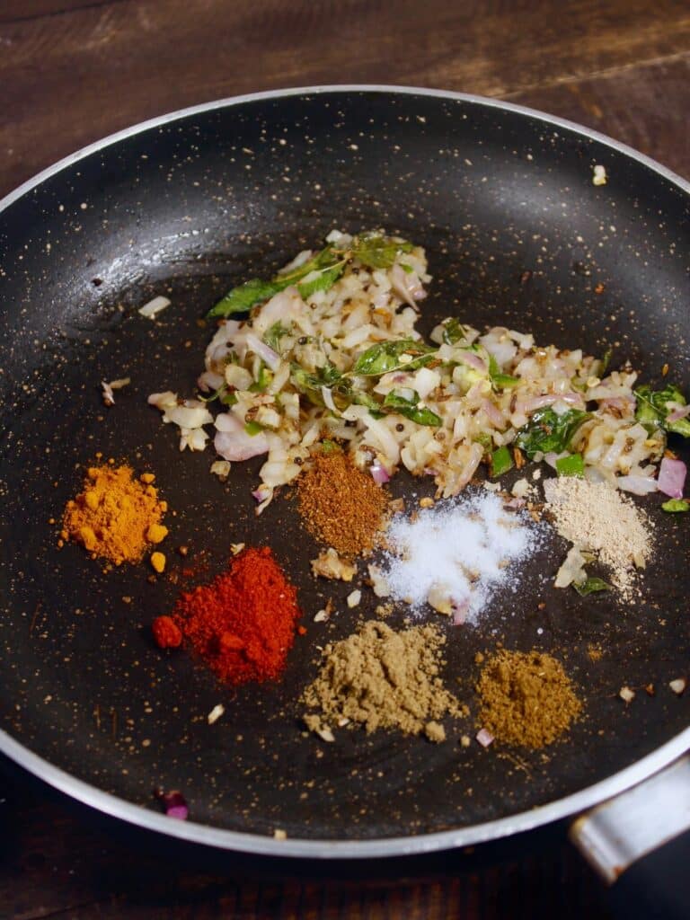 add powdered spices to the pan and saute 