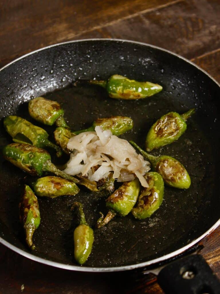 add bamboo shoots to the pan 