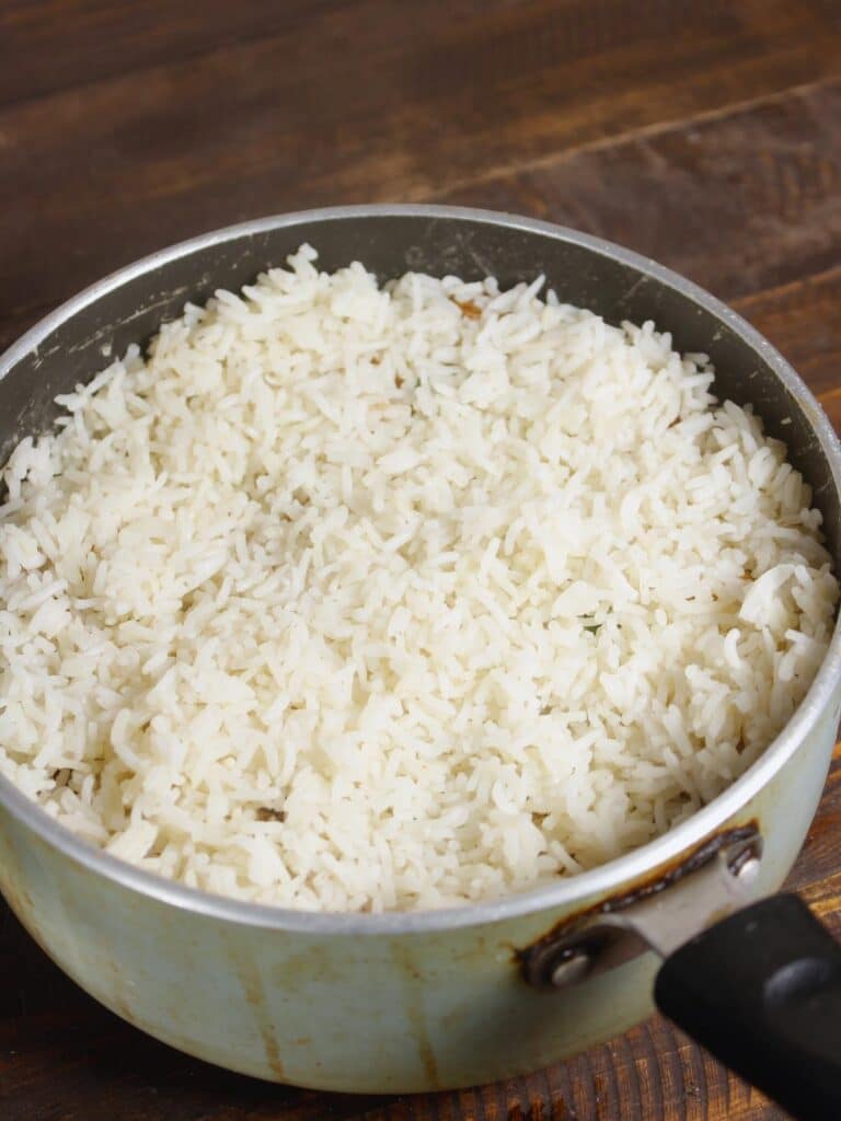 cover the top with cooked rice 