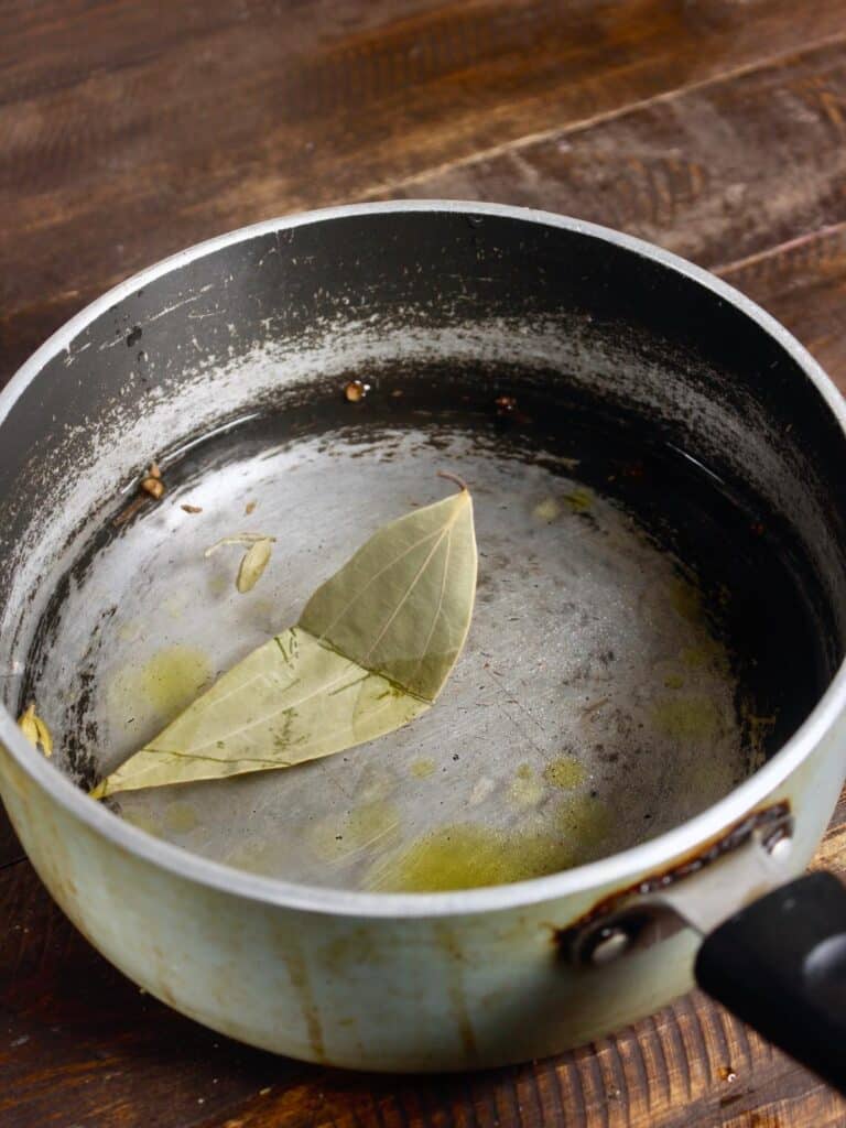 boil water & whole spices in a vessel