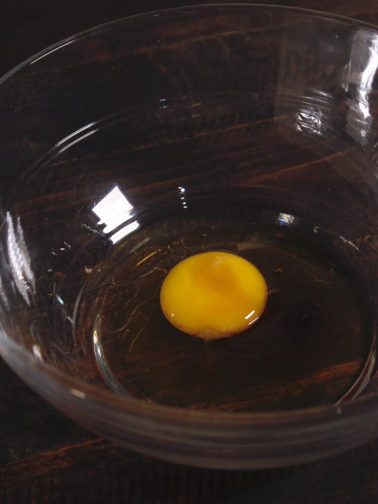 take egg, salt and vanilla essence into the bowl 