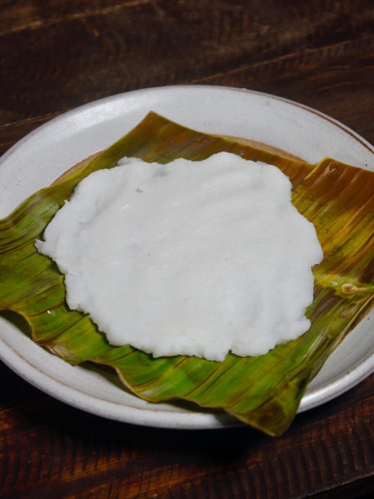place the rice flour dough on banana leaf 