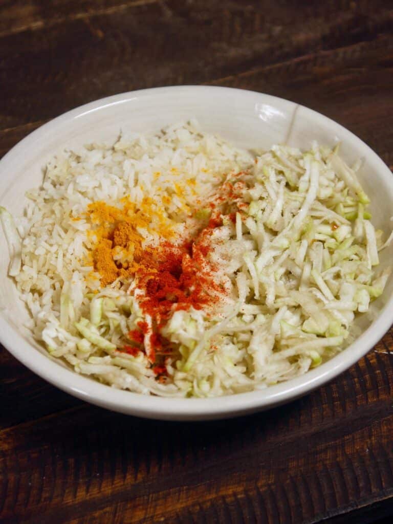 take leftover rice and other ingredients into the bowl 